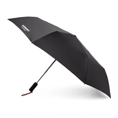 Shop Burberry Black Logo Folding Umbrella