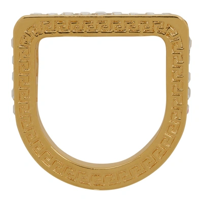 Shop Versace Gold Crystal Cut-out Logo Ring In Dco0h Crygl