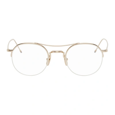 Shop Thom Browne Gold Tb903 Glasses