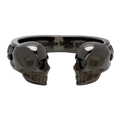 Shop Alexander Mcqueen Gunmetal Twin Skull Ring In 0995 Dk Rutenio Ant.