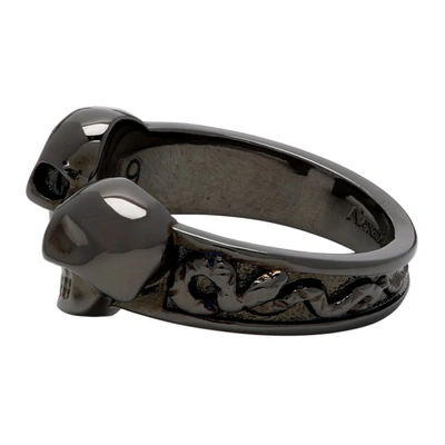 Shop Alexander Mcqueen Gunmetal Twin Skull Ring In 0995 Dk Rutenio Ant.