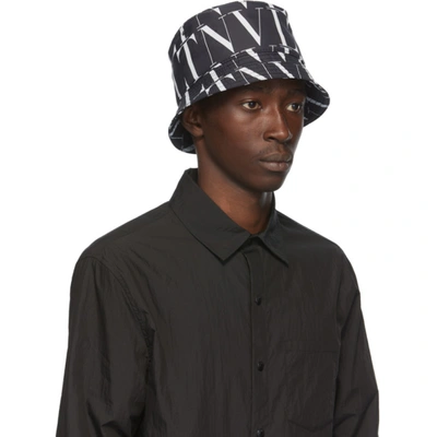 Shop Valentino Black & White  Garavani 'vltn' Bucket Hat In Black/white