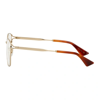 Shop Gucci Gold Round Glasses In 001 Gold