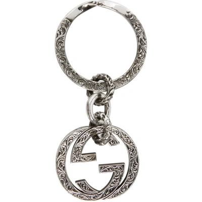 Shop Gucci Silver Engraved Interlocking G Keychain In Ybf455308001