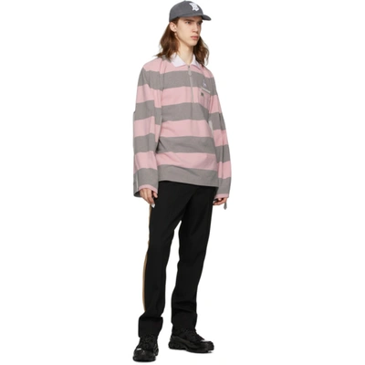 Shop Burberry Pink And Grey Striped Zip Detail Polo In Pale Pink I