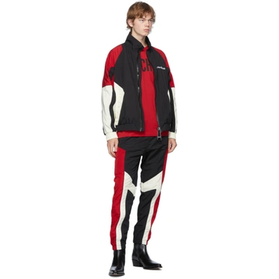 Shop Moschino Black & Red Broken Logo Track Jacket In A2555 Black