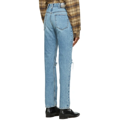 Shop Gucci Blue Ripped Eco Washed Jeans In 4009 Light