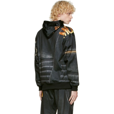 Shop Moschino Black & Gold Leather Print Hoodie In A1555 Black