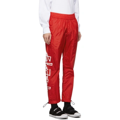 Shop Palm Angels Red Desert Logo Track Pants In Red/white