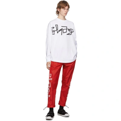 Shop Palm Angels Red Desert Logo Track Pants In Red/white