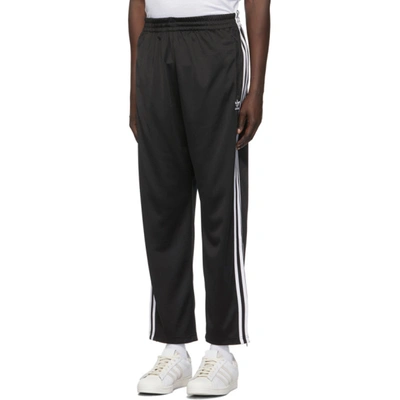 Shop Adidas Originals Black Firebird Track Pants