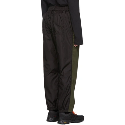 Shop Moncler Genius 5 Moncler Craig Green Green & Black Nylon Trousers In 889green