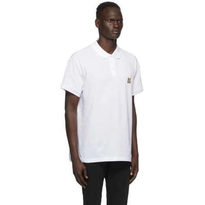 Shop Moschino White Teddy Polo In A1001 White