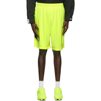 Shop Balenciaga Yellow & Black Mesh Soccer Shorts In 7110fluo Y