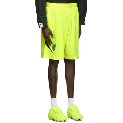 Shop Balenciaga Yellow & Black Mesh Soccer Shorts In 7110fluo Y