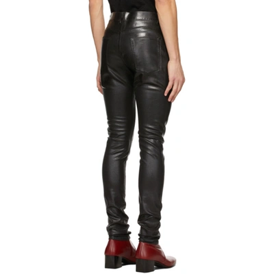 Shop Saint Laurent Black Oily Coated Skinny Jeans In 1116 Oilcoa