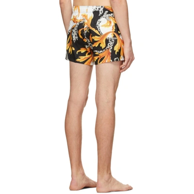 Shop Versace Black & Gold Acanthus Swim Shorts In A7027 White