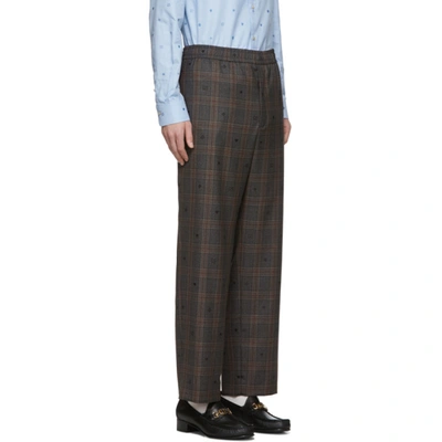 Shop Gucci Grey Wool Symbols Check Trousers In 1226blkylw