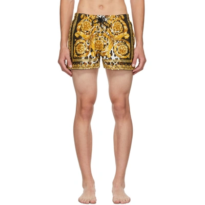 Shop Versace Gold & Black Barocco Swim Shorts In A7900 Black