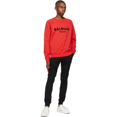 Shop Balmain Red Flocked Logo Sweatshirt In 3kf Rouge