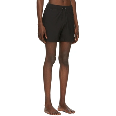 Shop Amiri Black Logo Core Swim Shorts