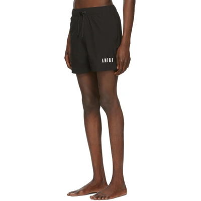 Shop Amiri Black Logo Core Swim Shorts