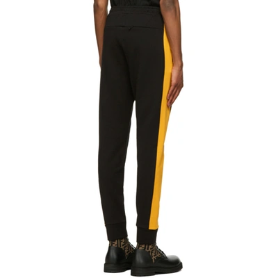 Shop Fendi Black & Yellow Logo Lounge Pants In F0g8t Blkyl