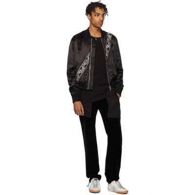 Shop Amiri Black Velvet Commando Patch Lounge Pants In Blk