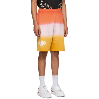 Shop Givenchy Orange Faded Effect 'studio Homme' Shorts In 801-dark Or