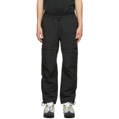 Shop Nike Black Tech Pack Sweatpants In 010 Black