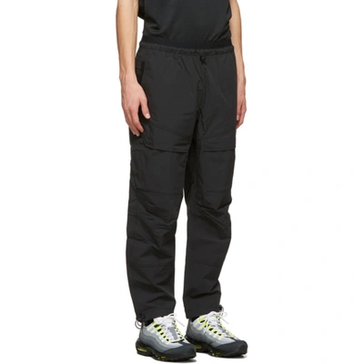 Shop Nike Black Tech Pack Sweatpants In 010 Black