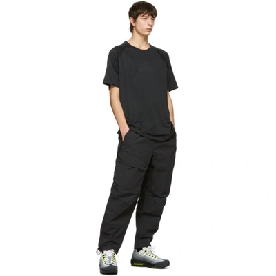 Shop Nike Black Tech Pack Sweatpants In 010 Black