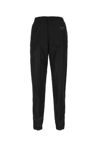 Shop Prada Logo Plaque Jogging Pants In Black