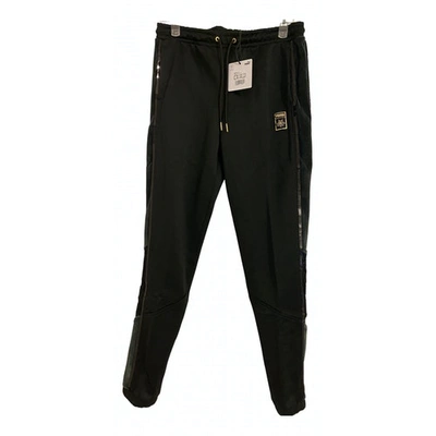 Pre-owned Charlotte Olympia Trousers In Black