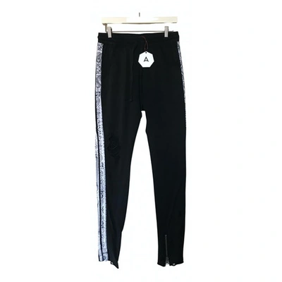 Pre-owned Alchemist Trousers In Black