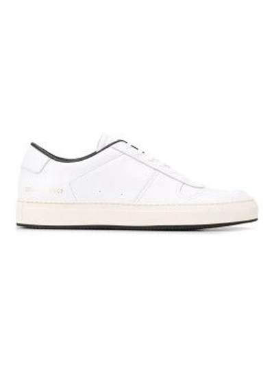 Shop Common Projects Low Top Sneakers In White