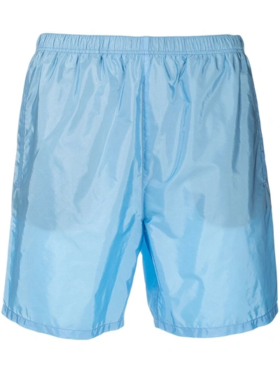Shop Prada Elasticated Waistband Swim Shorts In Blau