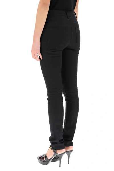 Shop Saint Laurent Skinny Jeans In Black