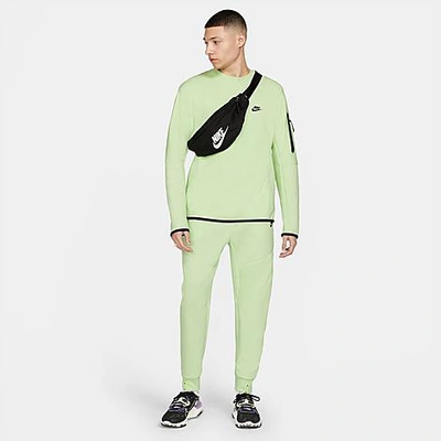 Shop Nike Tech Fleece Taped Jogger Pants In Light Liquid Lime/black