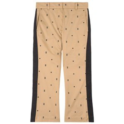 Shop Burberry Beige Star And Monogram Motif Trousers In Blue