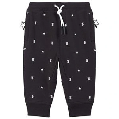 Shop Burberry Black Star And Monogram Motif Sweatpants In Blue