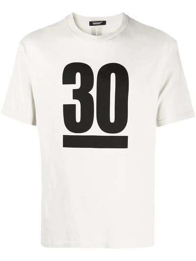 Shop Undercover Slogan-print Cotton T-shirt In Neutrals