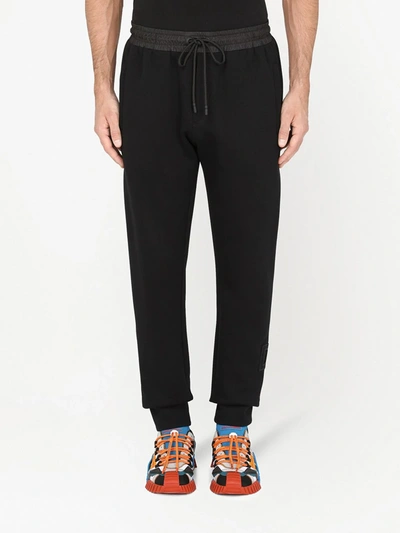 Shop Dolce & Gabbana Logo-print Tapered-leg Track Pants In Black