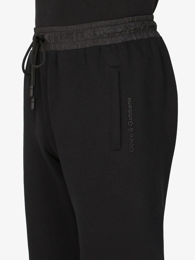 Shop Dolce & Gabbana Logo-print Tapered-leg Track Pants In Black