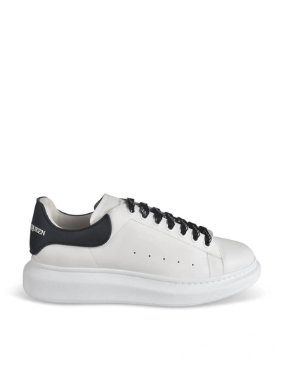 Shop Alexander Mcqueen Larry Sneakers In White And Black