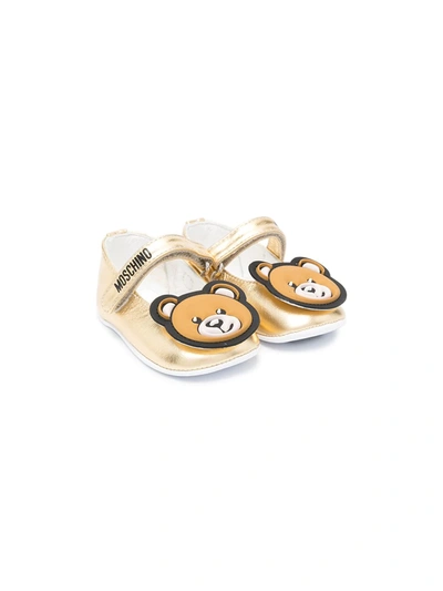 Shop Moschino Teddy-embellished Ballerina Shoes In Gold