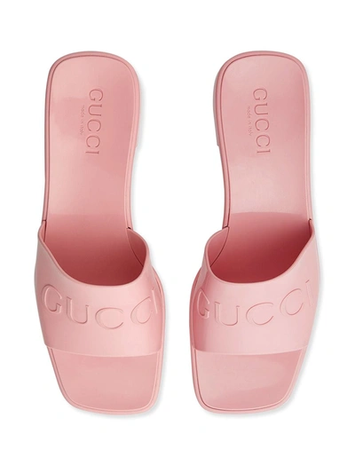 Shop Gucci Slider Logo Rubber Mules In Pink