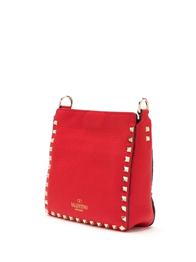 Shop Valentino Mini Rockstud Crossbody Bag In Red