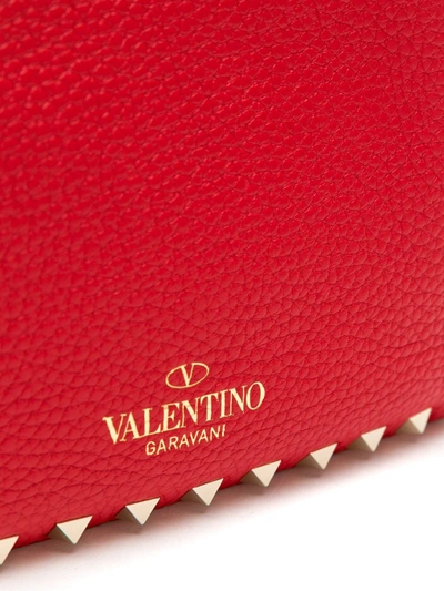Shop Valentino Mini Rockstud Crossbody Bag In Red