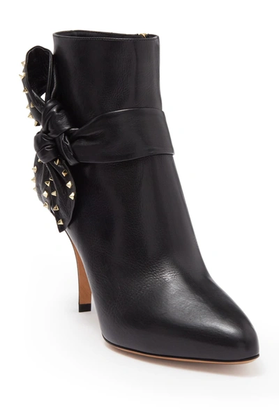 Shop Valentino Studded Bow Bootie In Nero